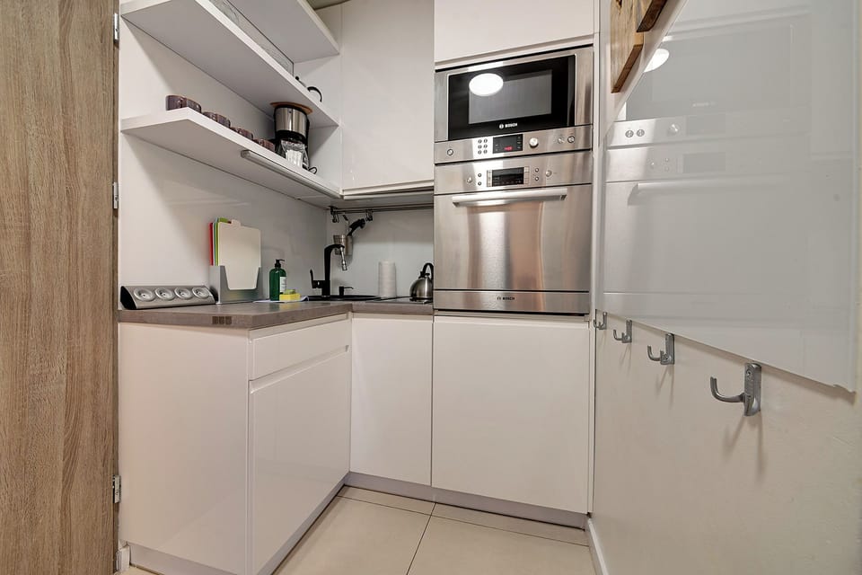 Apartment, Balcony | Private kitchen | Coffee/tea maker, electric kettle