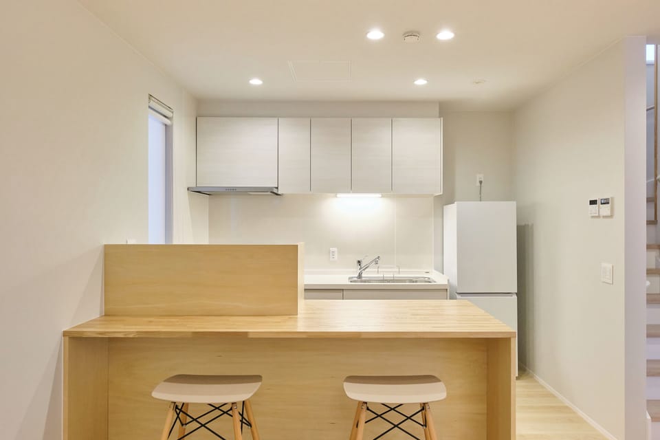Comfort Condo, Non Smoking | Private kitchen | Electric kettle, cleaning supplies, dining tables