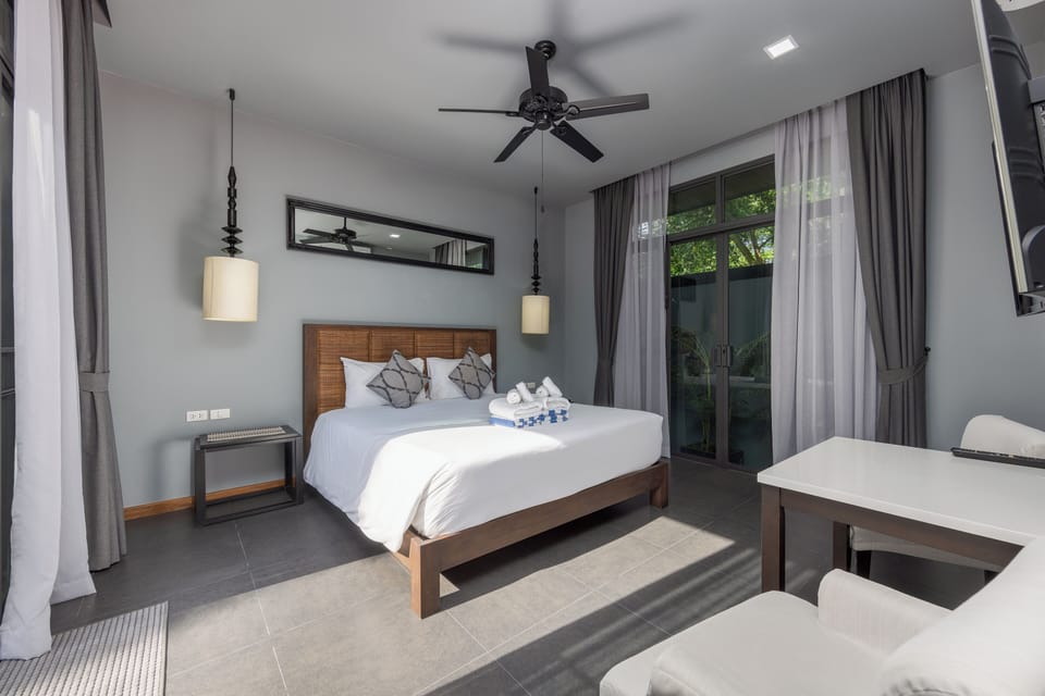 Comfort Villa, 2 Bedrooms, Pool View | In-room safe, iron/ironing board, free WiFi