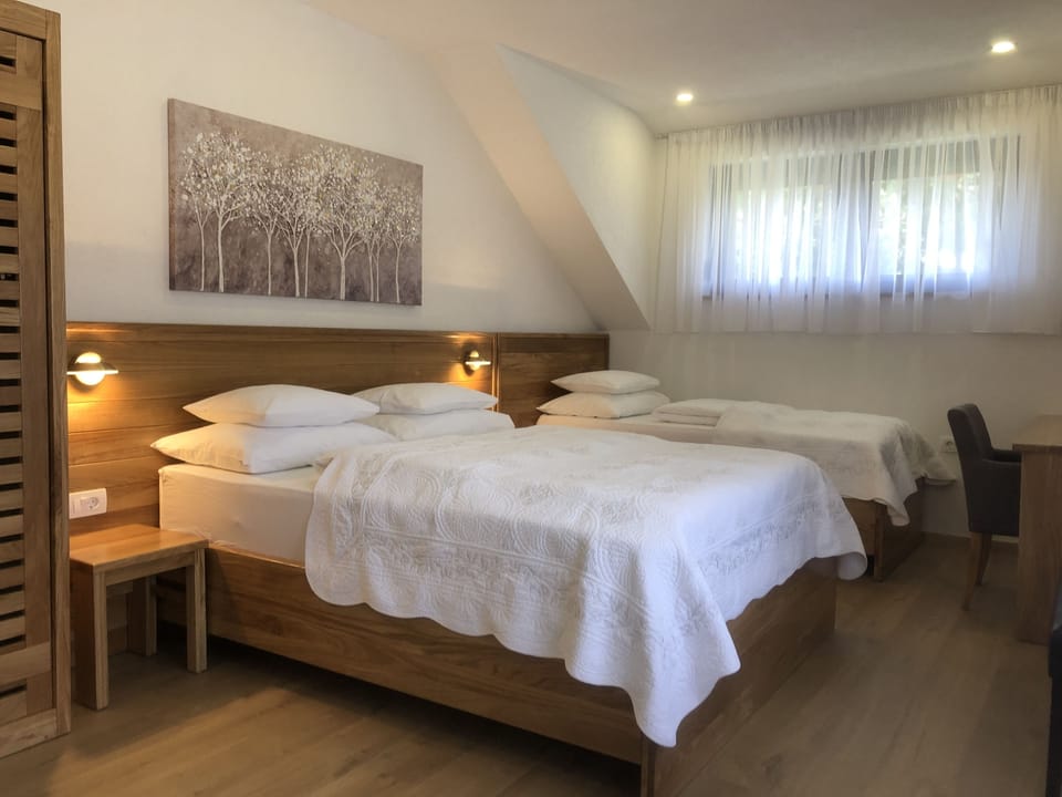 Standard Triple Room, Garden View, Annex Building | Memory foam beds, desk, laptop workspace, cribs/infant beds