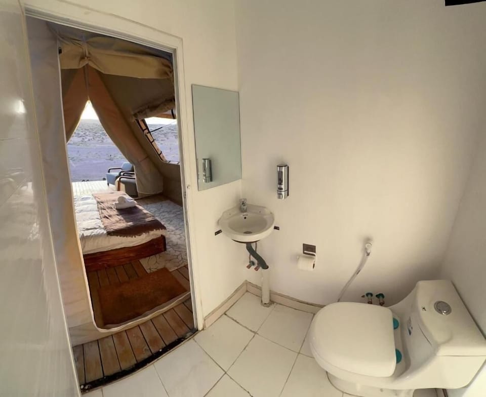 Tent, Patio, Resort View | Bathroom | Shower, free toiletries, bathrobes, bidet
