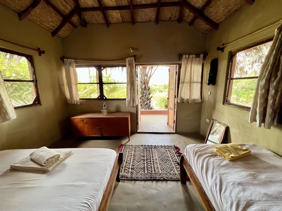 Premium Triple Room, Accessible, Ocean View | Soundproofing, bed sheets
