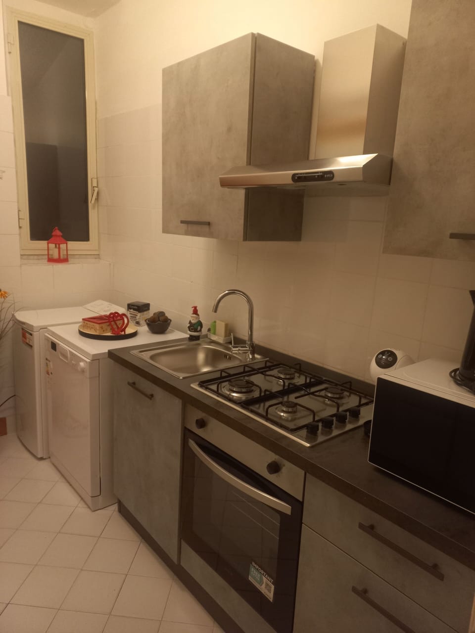 Comfort Apartment | Private kitchen | Electric kettle, toaster, cleaning supplies, freezer