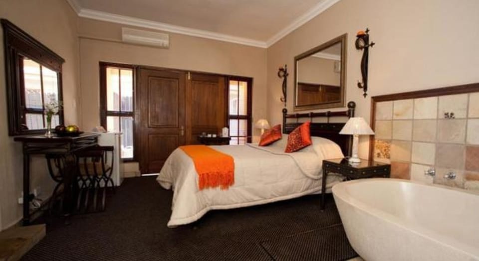 Honeymoon Room | Desk, laptop workspace, blackout drapes, iron/ironing board