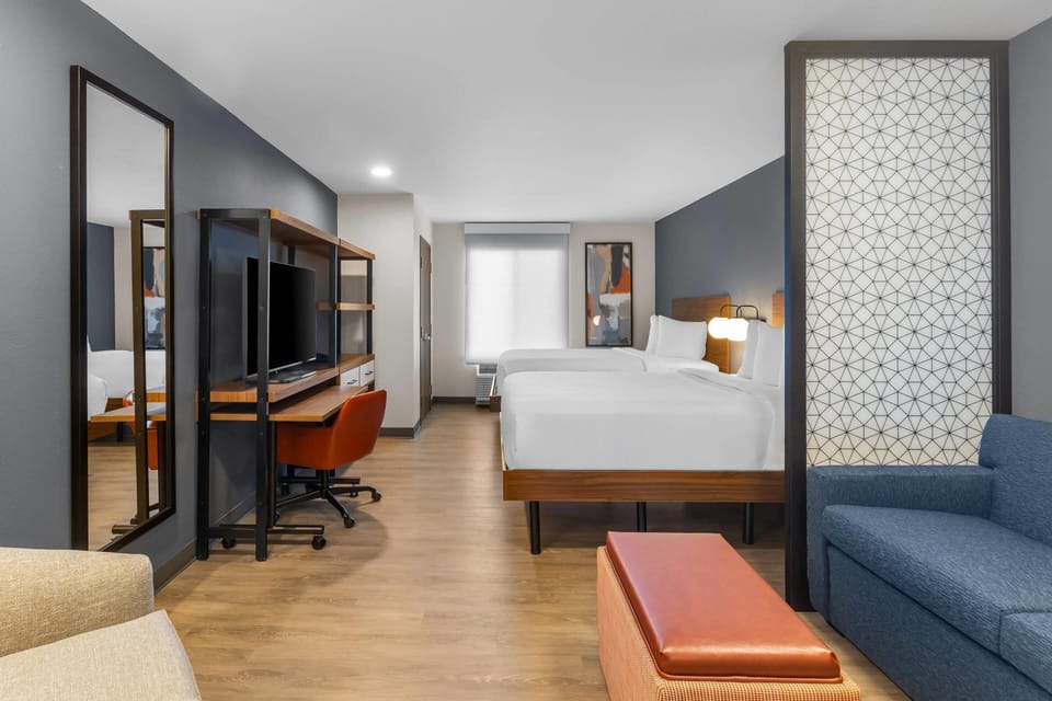 Standard Suite, 2 Queen Beds, Non Smoking | Pillowtop beds, desk, laptop workspace, iron/ironing board
