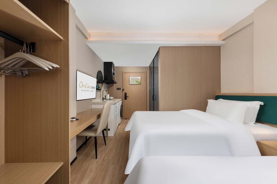 Twin Room, Hill View | Living area | TV, foosball, books