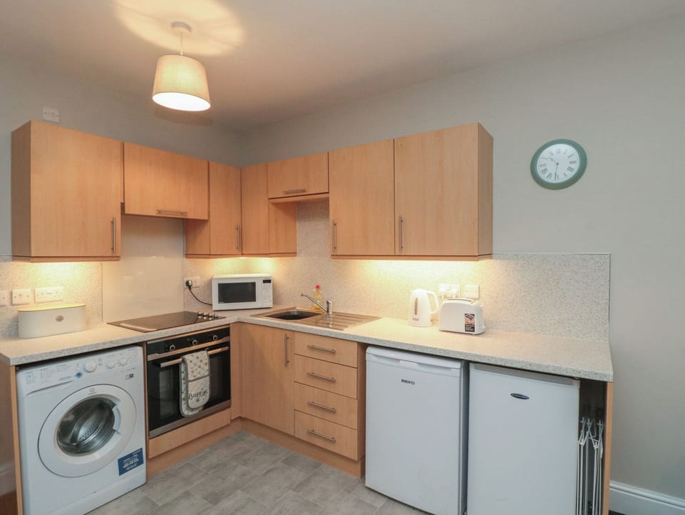 Fridge, microwave, toaster, cookware/dishes/utensils