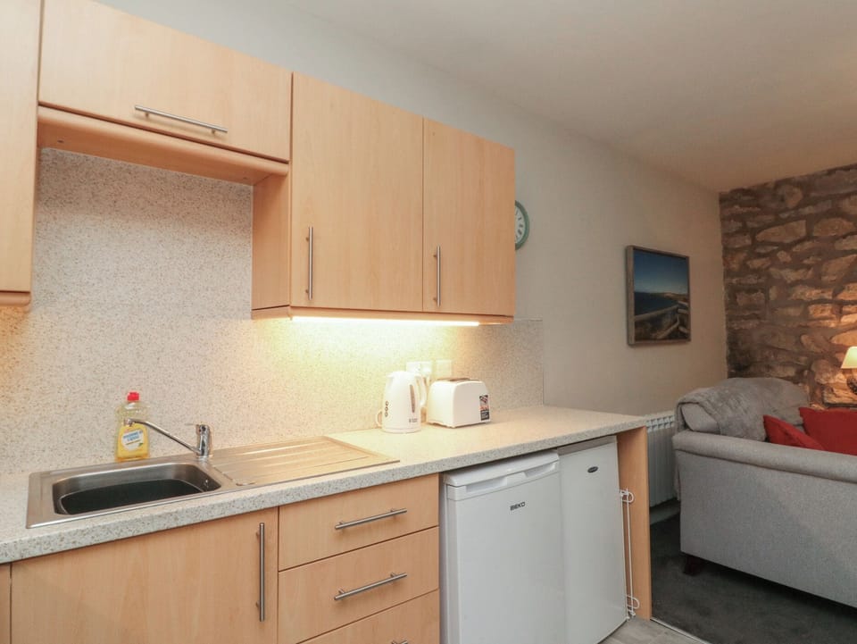 Fridge, microwave, toaster, cookware/dishes/utensils