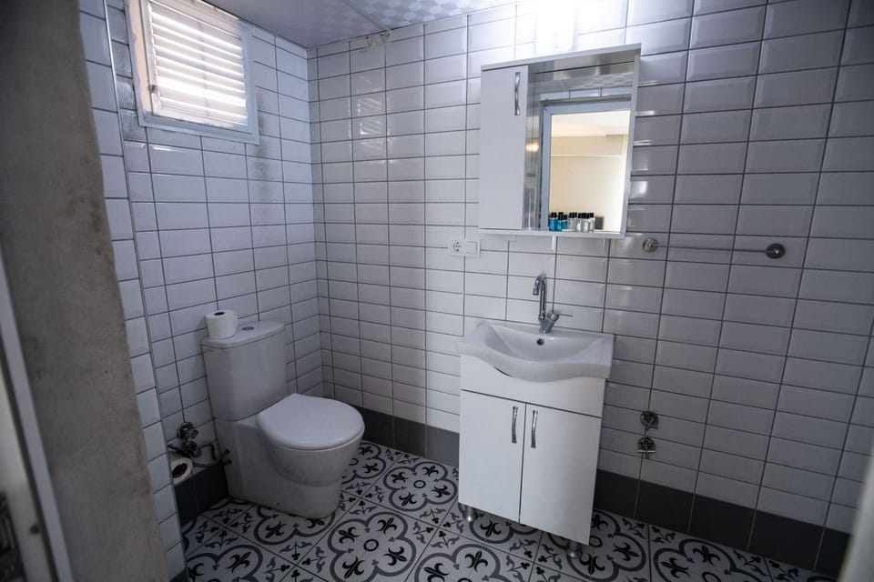 Comfort Triple Room, Balcony, City View | Bathroom | Shower, hair dryer, towels, soap