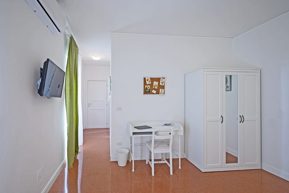 Double Room, Balcony, Garden View | Desk, laptop workspace, blackout drapes, iron/ironing board
