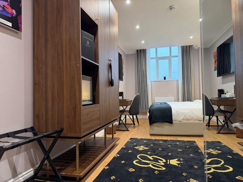 Luxury Suite, 1 King Bed, Non Smoking, City View | In-room safe, individually decorated, individually furnished, desk