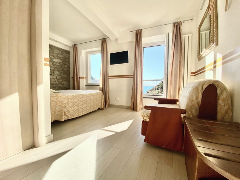 Panoramic Room, Multiple Beds, Air conditioning, Sea View | In-room safe, individually decorated, individually furnished, desk