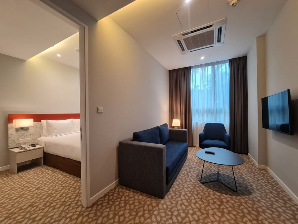 Suite, 1 Bedroom (Living Area) | In-room safe, desk, blackout drapes, iron/ironing board