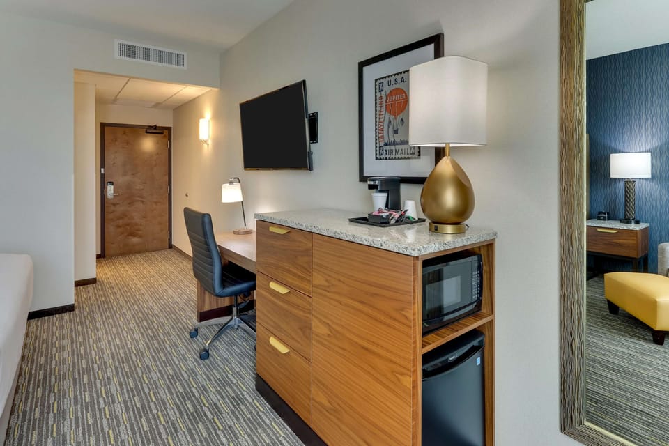 Desk, blackout drapes, iron/ironing board, free cribs/infant beds