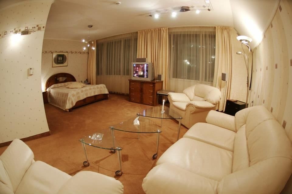 Deluxe Studio, City View | Living room | Flat-screen TV