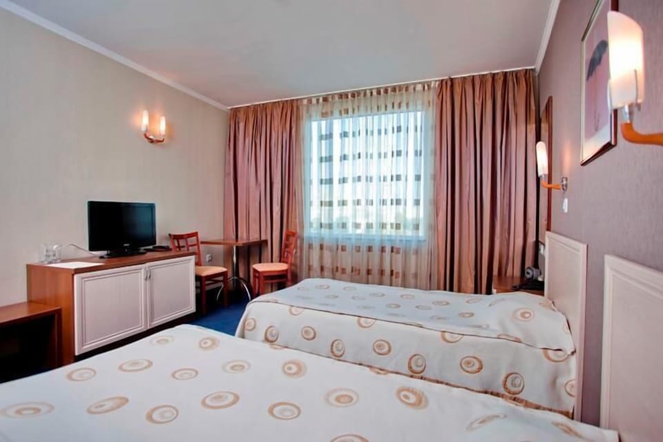 Standard Double or Twin Room, City View | Minibar, desk, soundproofing, free WiFi