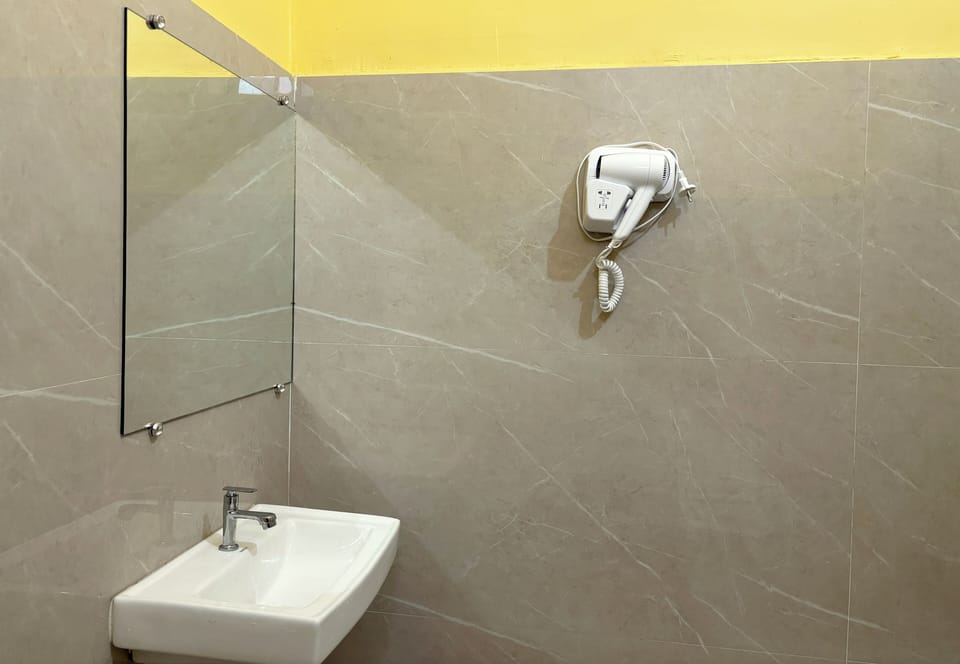 Shower, hair dryer, slippers, towels