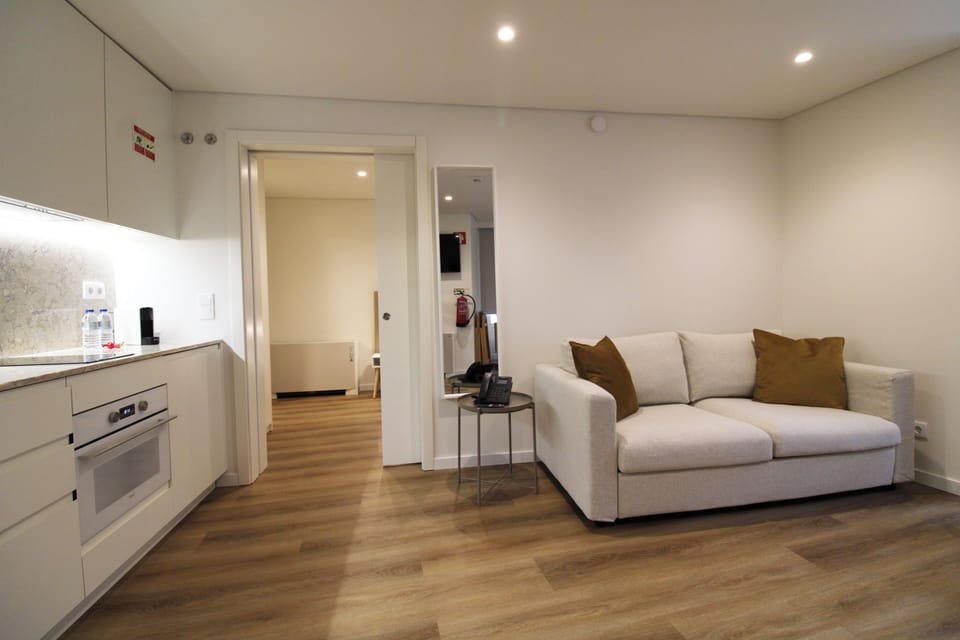 Apartment, 1 Bedroom, City View | Living area | 40-inch Smart TV with cable channels