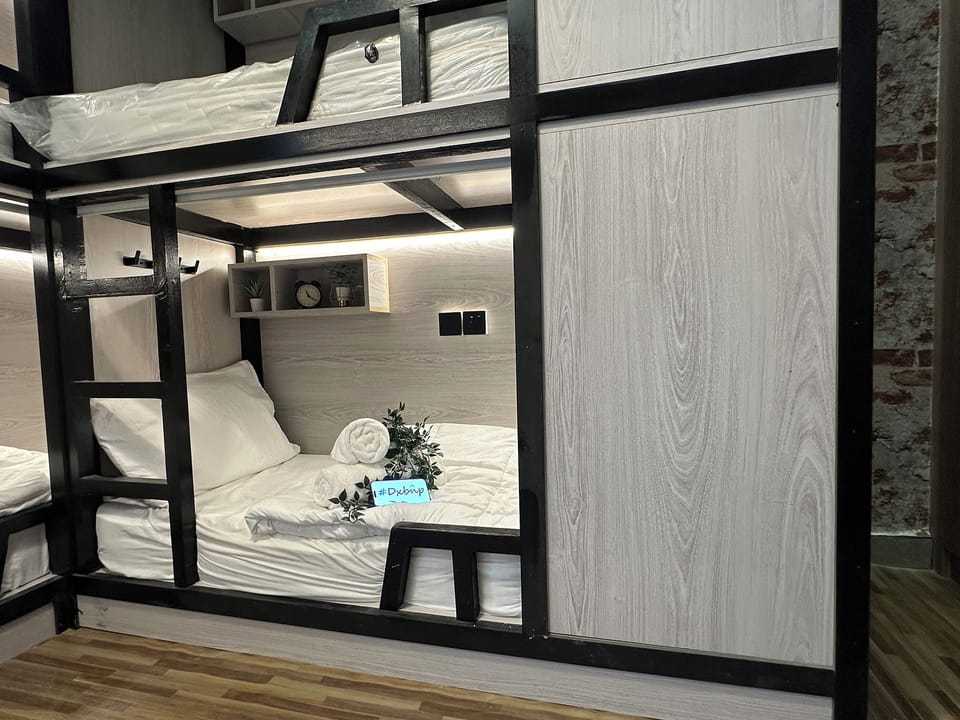 Shared Dormitory, Courtyard View | Desk, laptop workspace, iron/ironing board, free WiFi