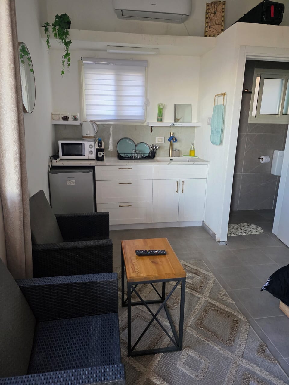 Mini-fridge, microwave, cookware/dishes/utensils