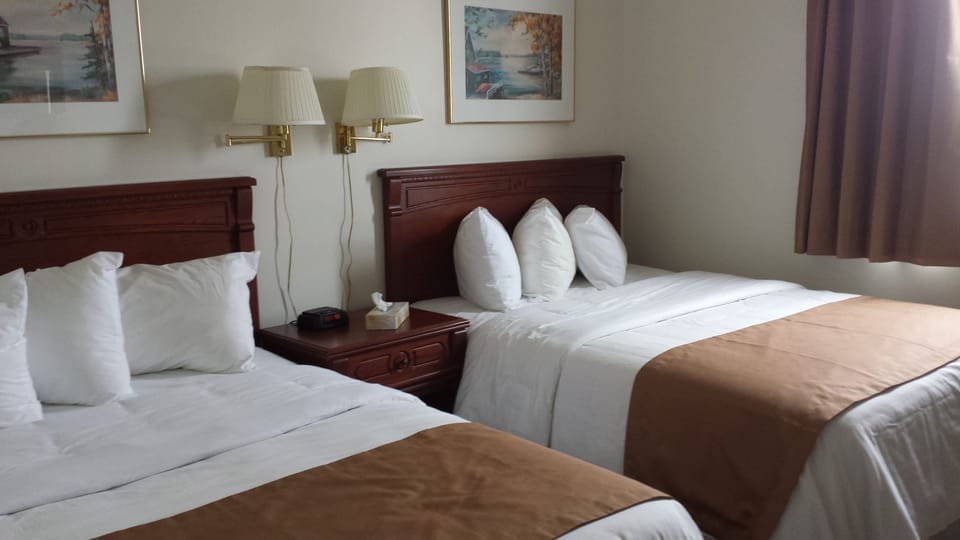 Standard Double Room, 2 Double Beds | Down comforters, iron/ironing board, free WiFi, bed sheets