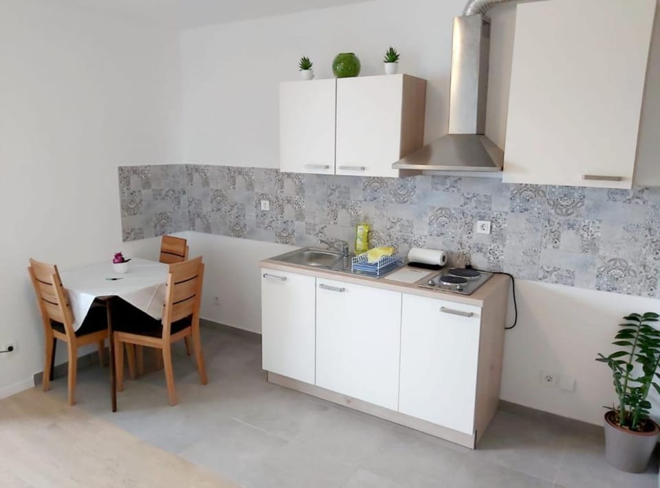 Studio (Studio Apartment With Balcony) | Living room | 32-inch flat-screen TV with satellite channels