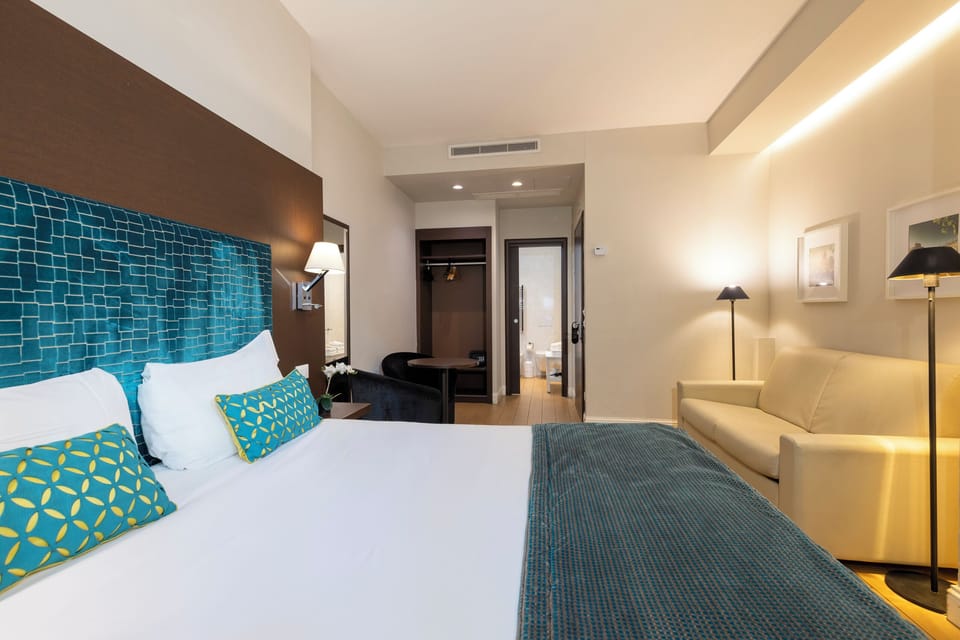 Family Room | In-room safe, blackout drapes, iron/ironing board (on request)