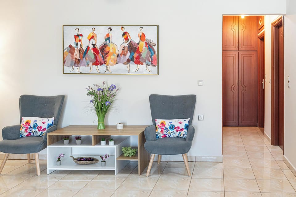 Superior Apartment, Mountain View | Living area | 50-inch Smart TV with cable channels