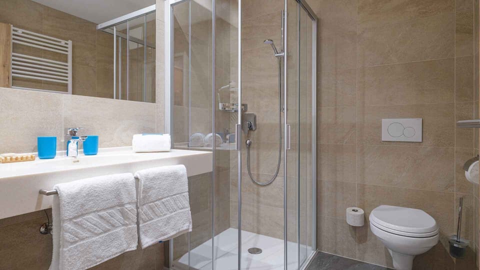 Standard Apartment, 2 Bedrooms, Balcony, Mountain View | Bathroom | Bathrobes