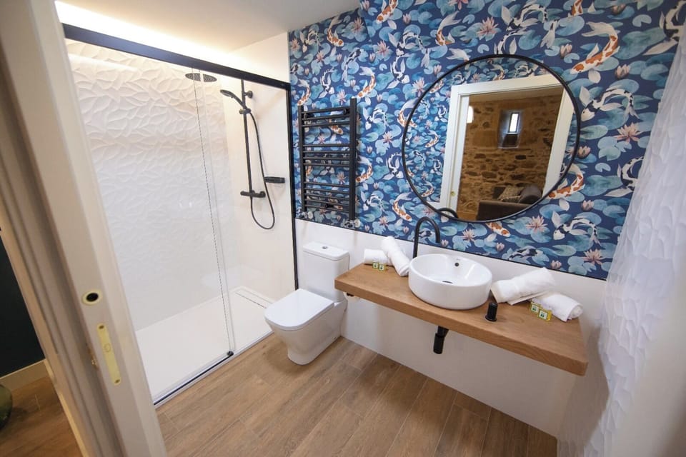 Family Apartment, Garden View | Bathroom | Shower, hair dryer, towels