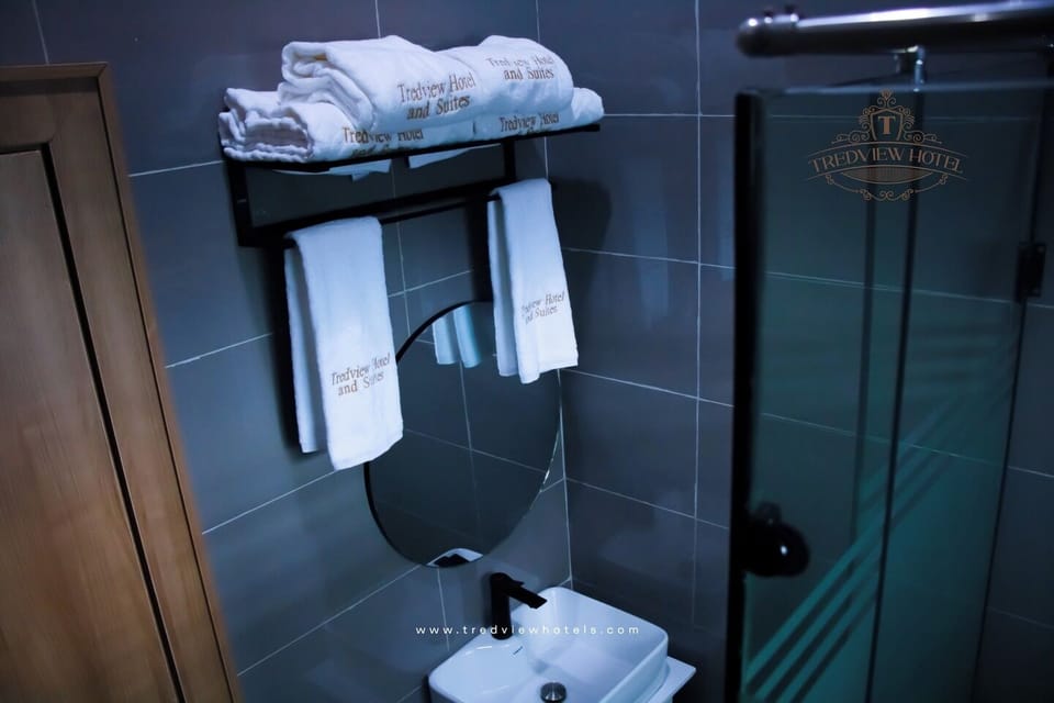 Economy Room, Balcony, City View | Bathroom | Free toiletries, hair dryer, towels, soap