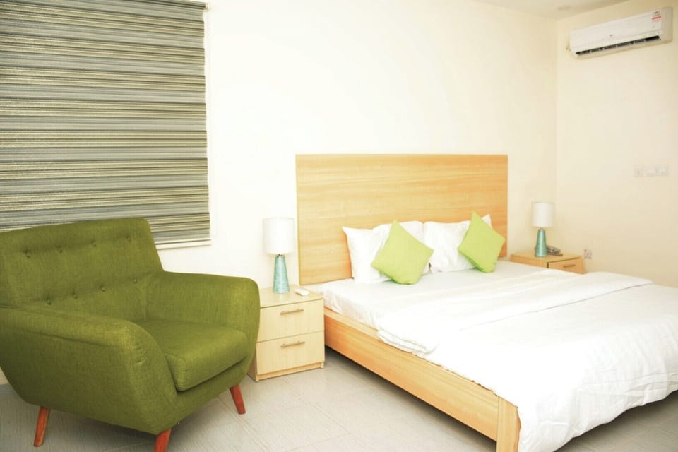 Deluxe Apartment, Balcony, City View | In-room safe, desk, laptop workspace, blackout drapes