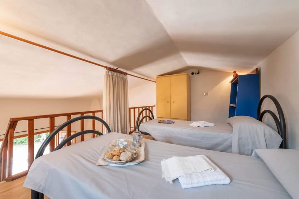 Apartment, 2 Bedrooms, Patio, Garden View | Dining