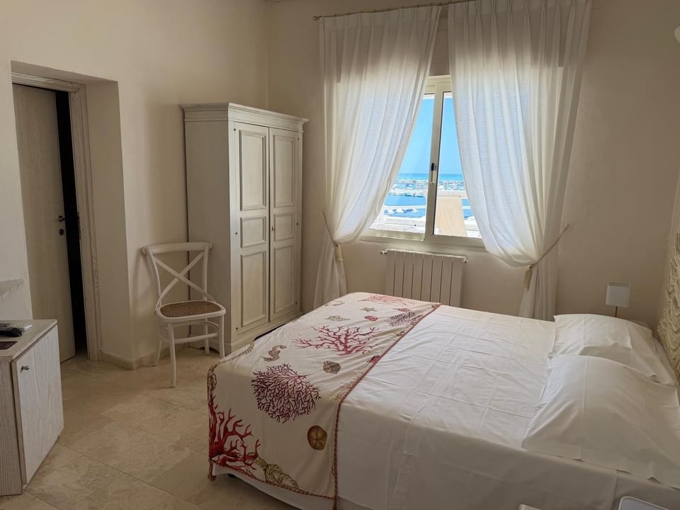 Standard Double Room, Sea View | Minibar, in-room safe, blackout drapes, WiFi (free)