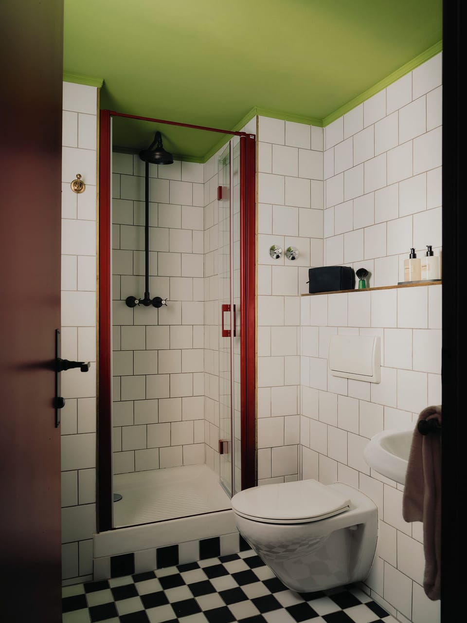 The Studio Suite | Bathroom | Shower, slippers, towels, soap