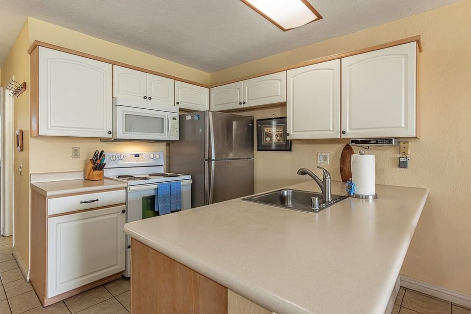 Condo, 2 Bedrooms | Private kitchen | Coffee/tea maker, fridge, oven, toaster