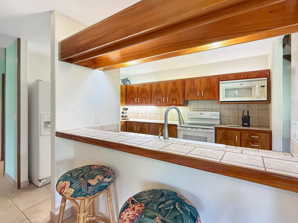 Condo, Multiple Beds, Lanai, Golf View (Kanaloa at Keauhou 1004) | Private kitchen | Coffee/tea maker