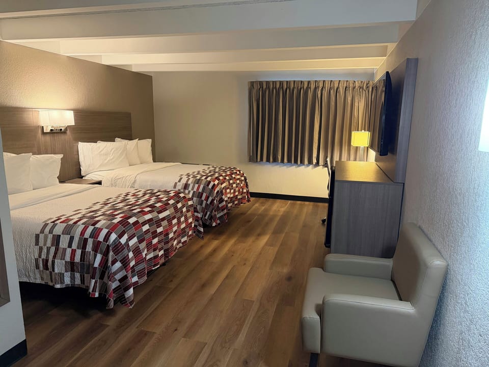 Desk, laptop workspace, free WiFi, bed sheets