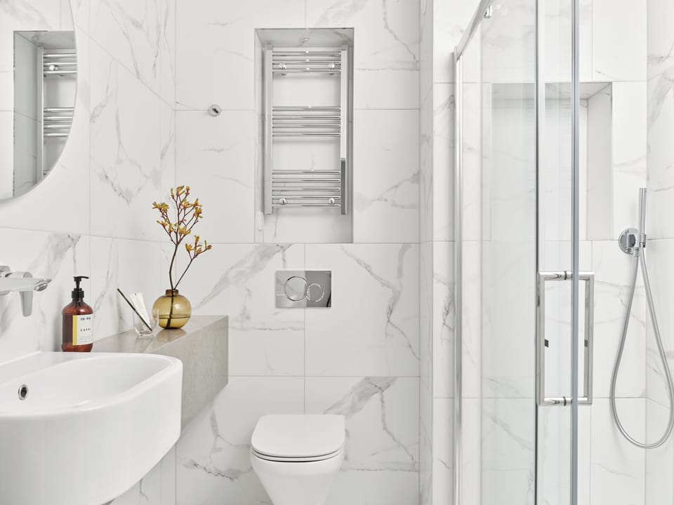 Shower, eco-friendly toiletries, hair dryer, towels