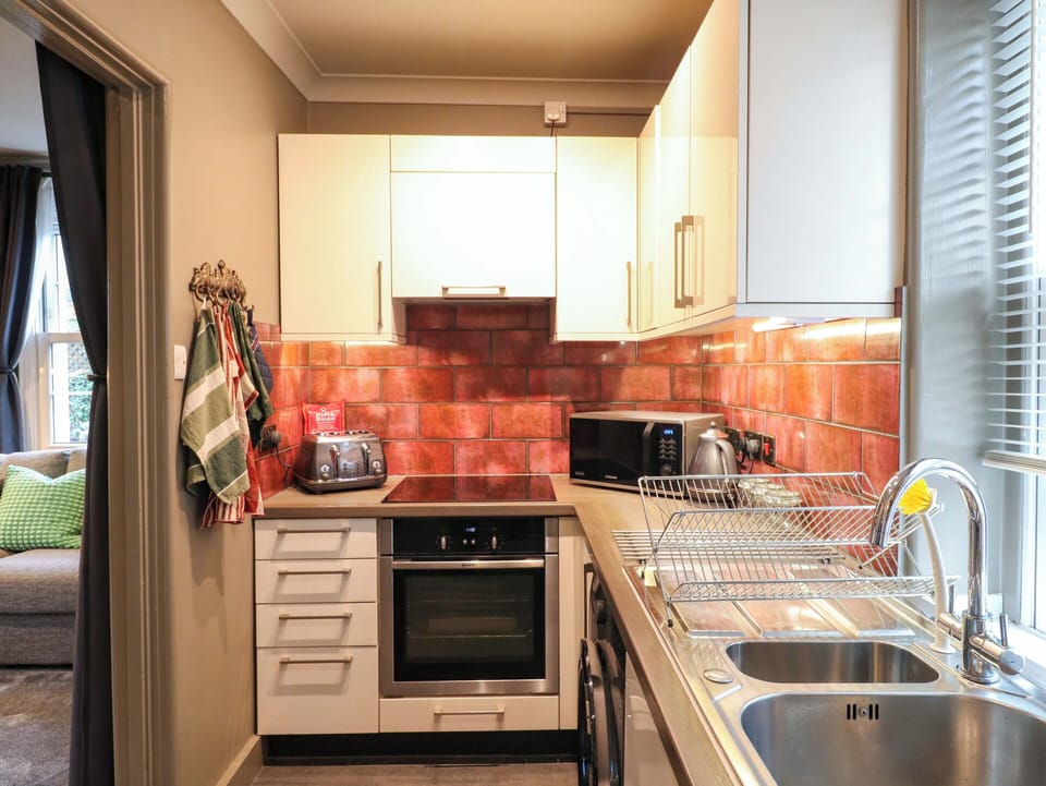 Fridge, microwave, toaster, cookware/dishes/utensils