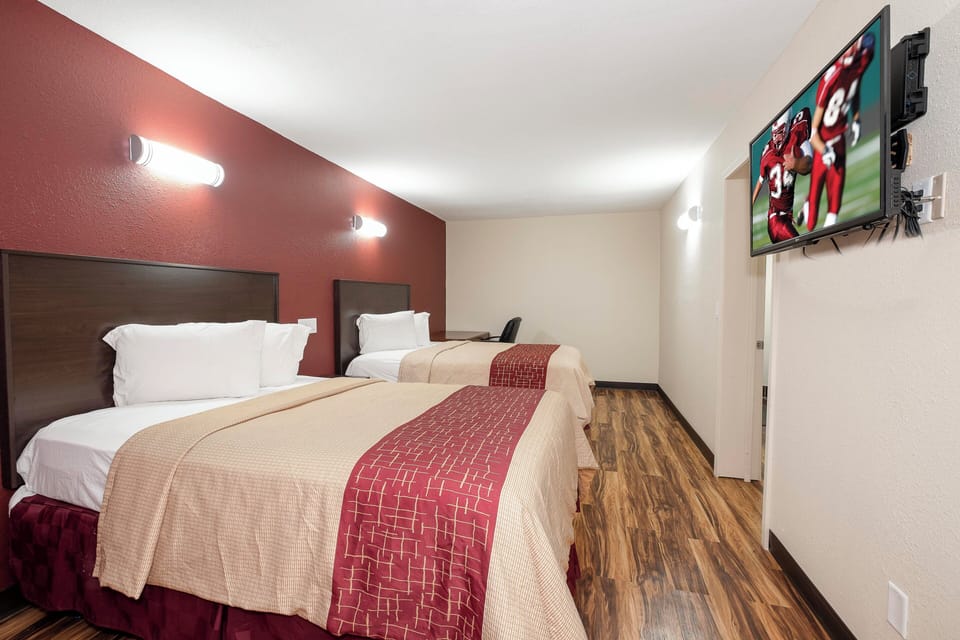 Suite, Non Smoking (1 King Bed and 2 Double Beds) | In-room safe, desk, iron/ironing board (on request), WiFi (free)