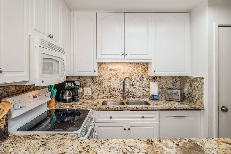 Condo, Multiple Beds, Balcony, Ocean View (Kamaole Sands 7-405) | Private kitchen | Coffee/tea maker, dining tables