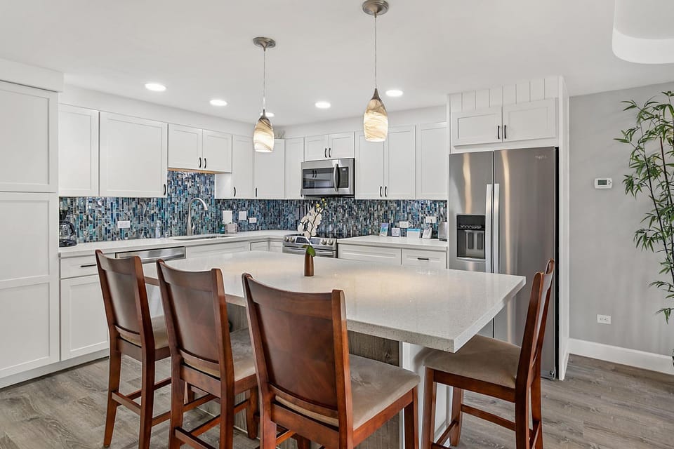 Condo, 1 King Bed with Sofa bed, Balcony, Garden View (Kamaole Sands 4-213) | Private kitchen | Coffee/tea maker, dining tables