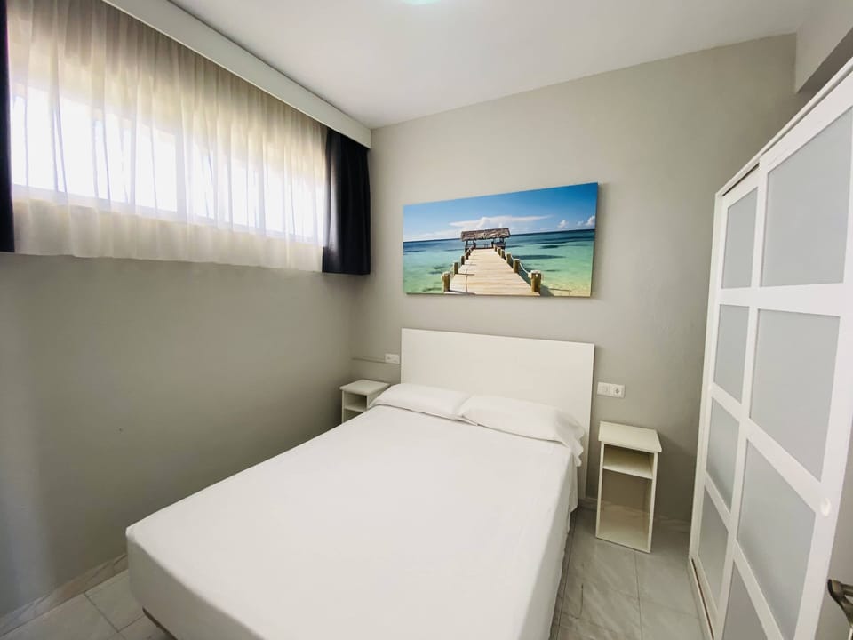 Family Apartment, Partial Sea View | In-room safe, iron/ironing board, free WiFi
