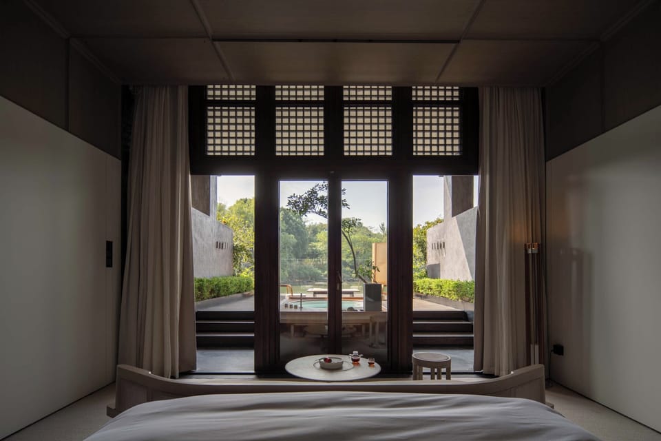 Luxury Suite, River View | Minibar, desk, laptop workspace, blackout drapes