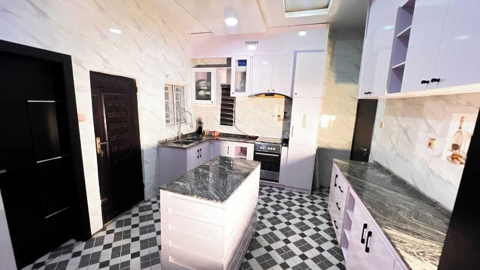 Family Apartment, Balcony, City View | Private kitchen | Fridge, microwave, oven, stovetop