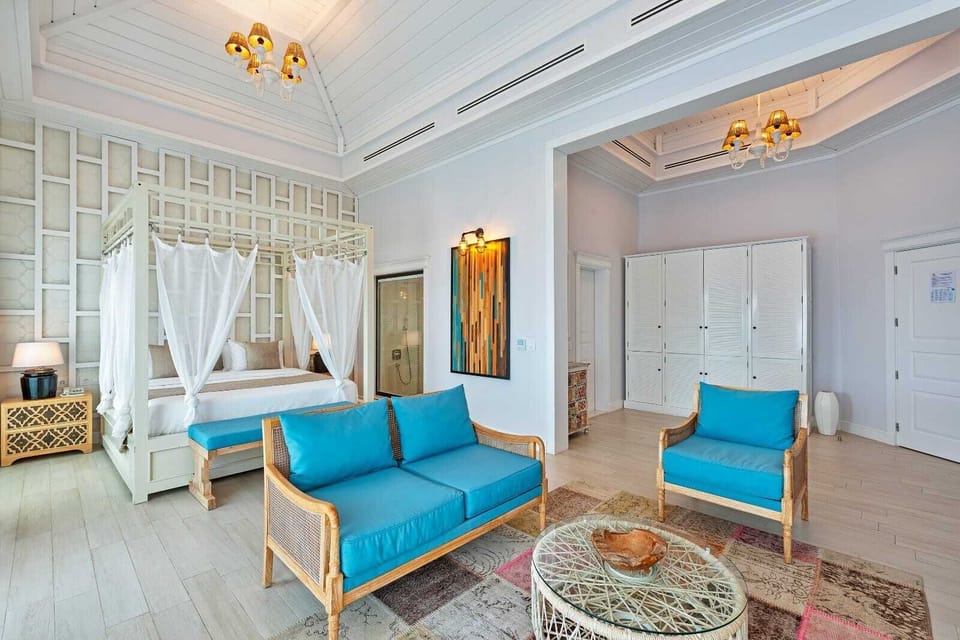 Signature Suite, Balcony, Sea View | Minibar, in-room safe, laptop workspace, soundproofing