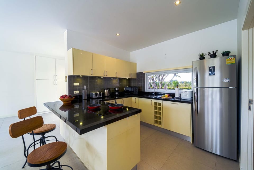 Villa, 3 Bedrooms, Patio, Garden View | Private kitchen | Full-size fridge, microwave, stovetop, dishwasher