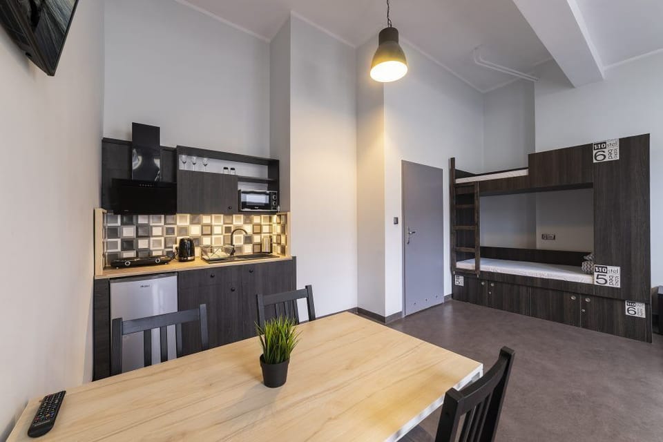 Classic Quadruple Room, Courtyard View | Iron/ironing board, free WiFi, bed sheets