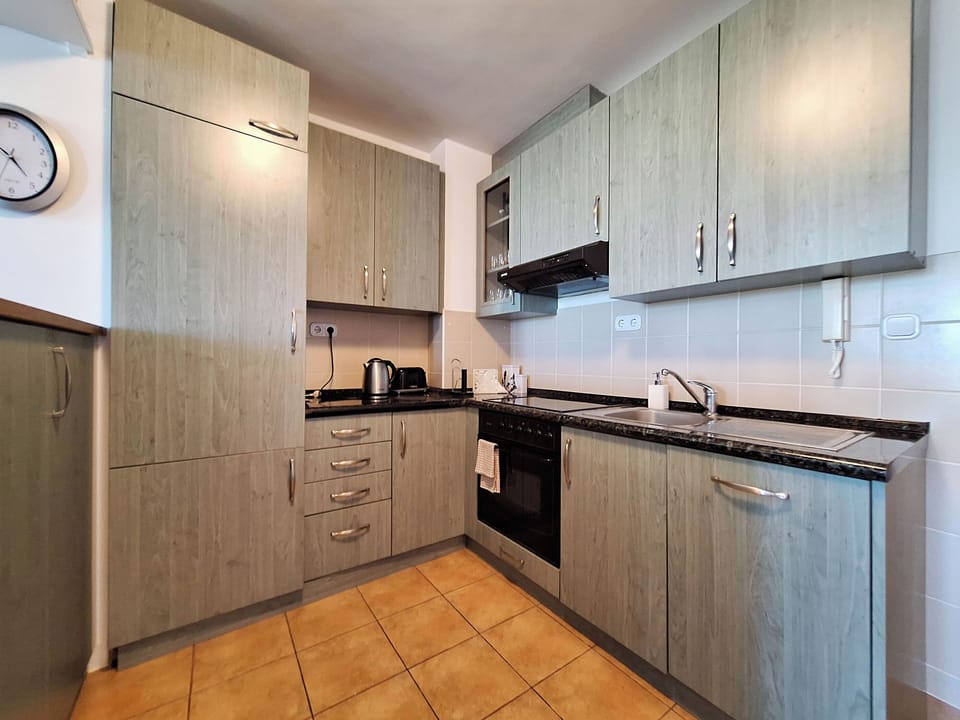 Apartment (A1) | Private kitchen | Fridge, microwave, oven, stovetop